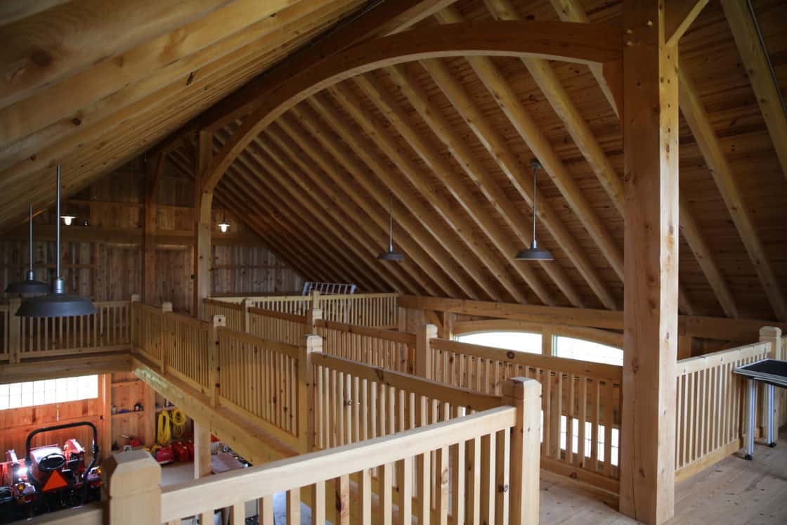 wooden hallway leading from one end to the other of custom garage
