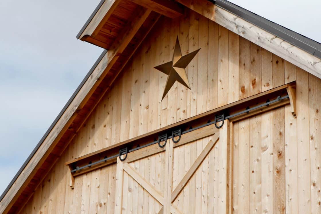 exterior top center view of custom garage with star decoration