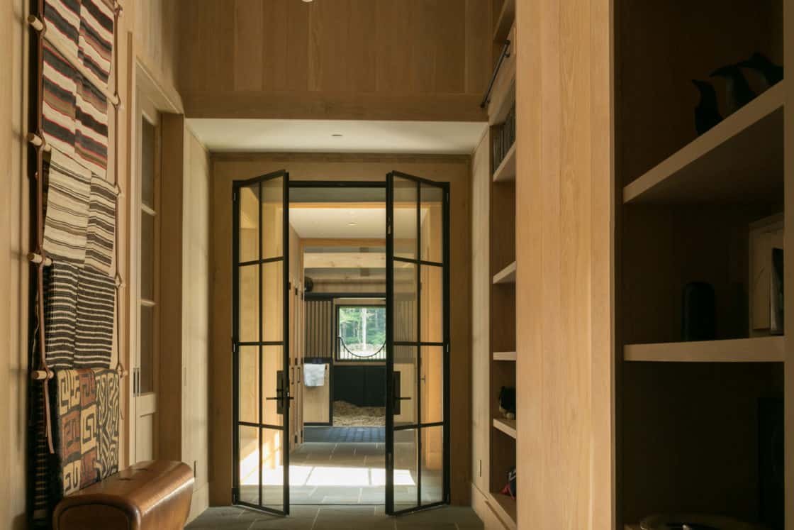 open doorway inside of newly built horse barn in greenwich ct
