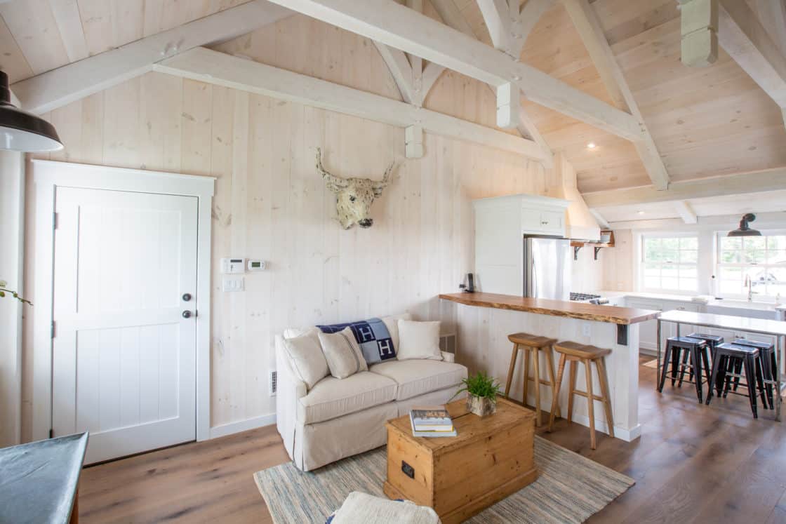 small kitchen with living room furniture inside party barn