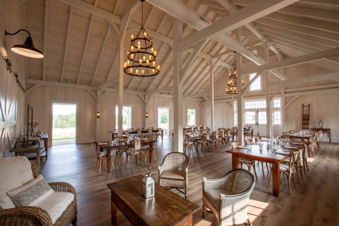 wooden indoor dining room furniture set up for party inside large room
