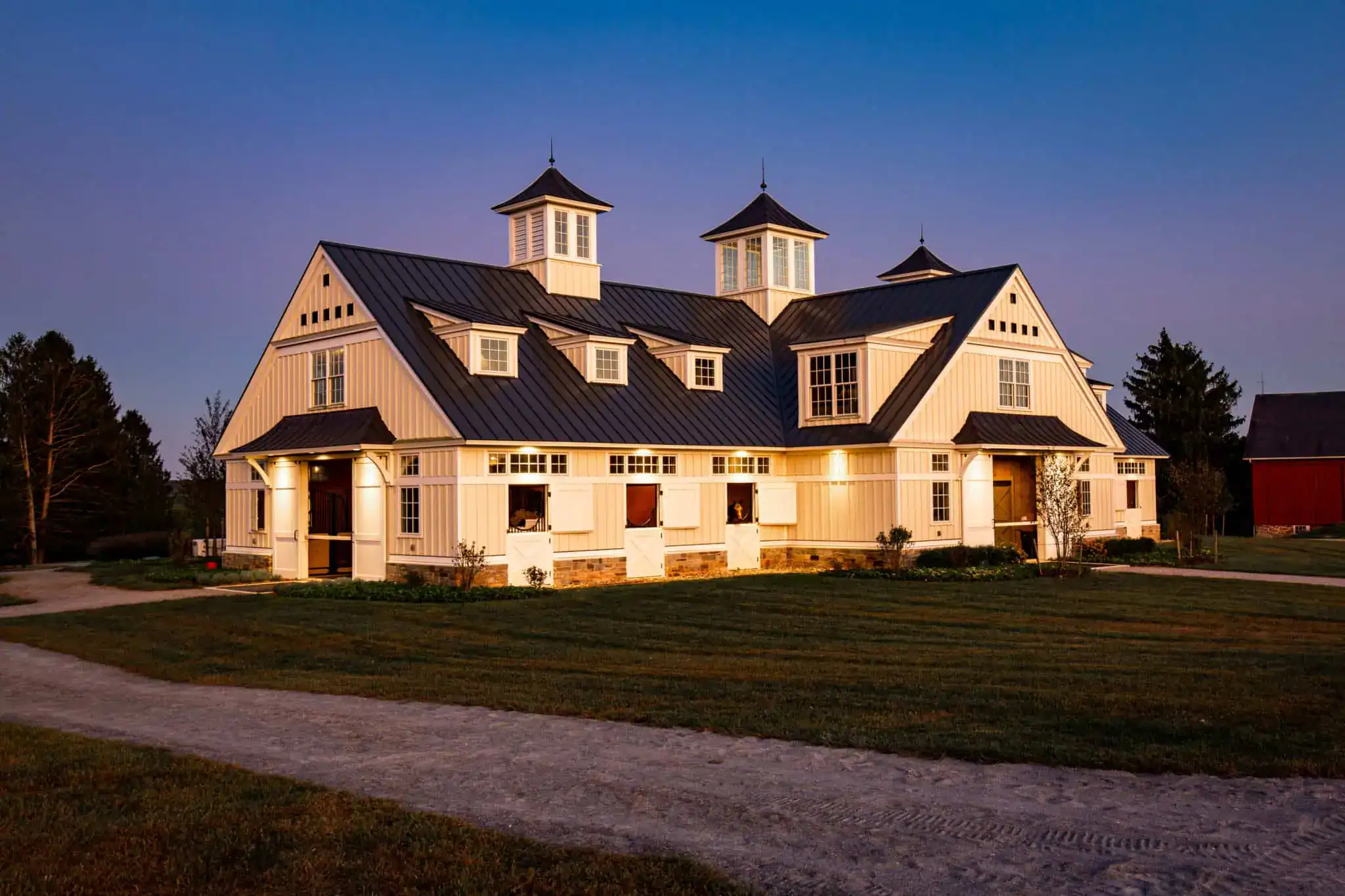 BD_Dryden_White_Hall_256 custom built structure sitting beneath an evening sky with various first level lights illuminated